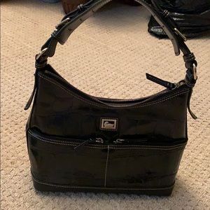 Dooney Bourke black shoulder bag with Gold Detail